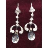 A pair of white gold belle epoch earrings, the leaf style pendants set with diamonds above crescents