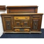 A Victorian carved oak sideboard, the back with shelf above an egg & dart frame flanked by fluted