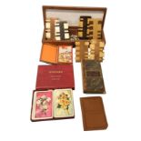 A collection of six hardwood & bone whist markers, cased sets cards, a Mazawattee pocket dictionary,