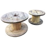 A pine cable drum, suitable for a garden table - 37.5in x 23in; and another smaller - 30in x