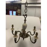 An alabaster & gilt metal hanging chandelier, suspended by chain with turned column above a boss