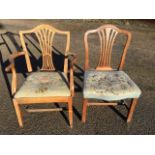 A mahogany Hepplewhite style elbow chair with arched back above pierced splat and needlework