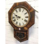 An American faux rosewood wallclock, the octagonal case framing a dial with roman chapters, the