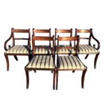 A set of six regency style mahogany dining chairs with brass inlay decoration to the back rails