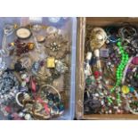 A quantity of jewellery including bead necklaces, bangles, some ivory, brooches, a miniature
