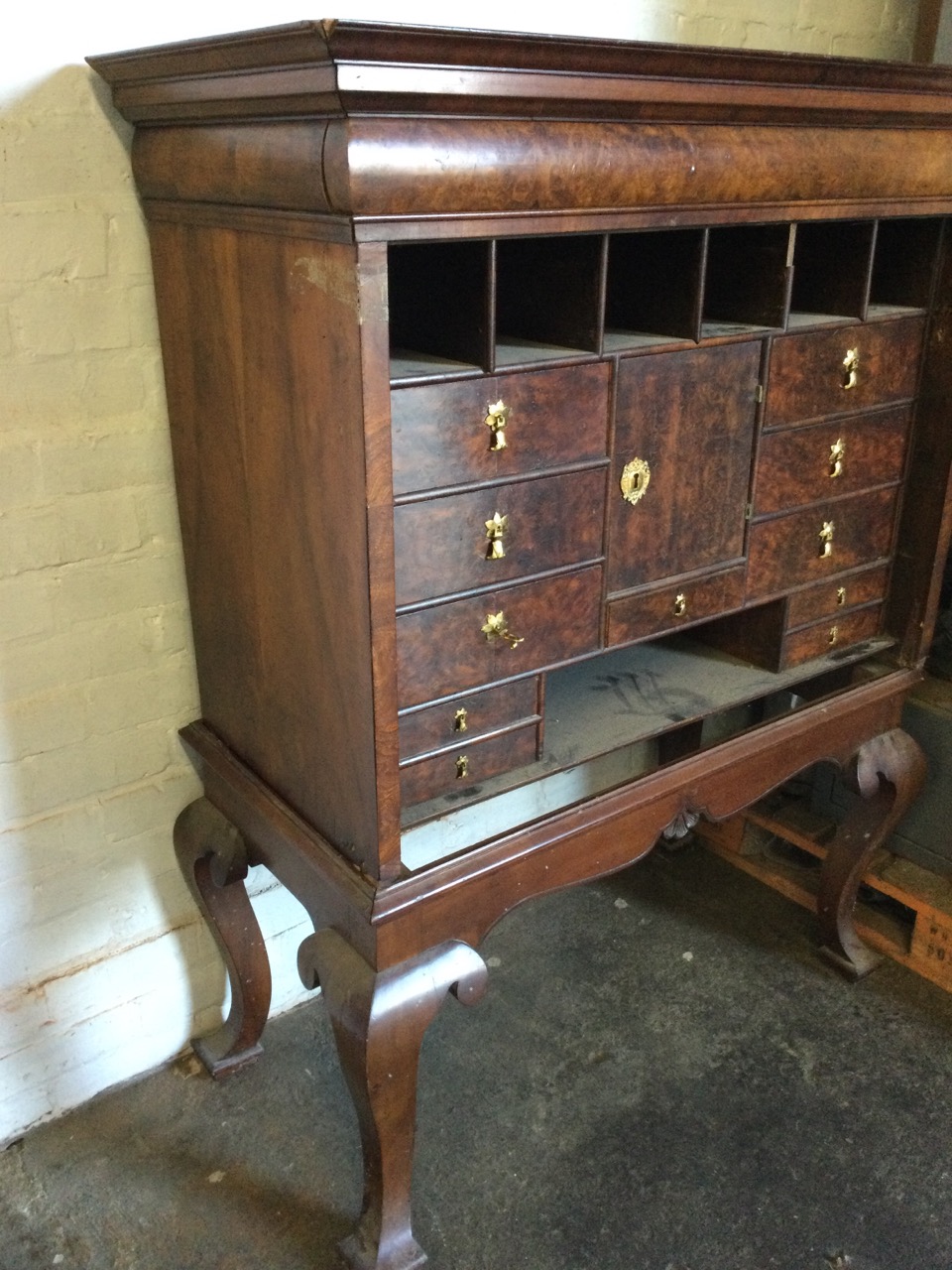 A walnut cabinet on stand having long cushion moulded frieze drawer above pigeonholes and drawers - Image 3 of 4