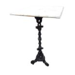 A cast iron pedestal with associated square marble top, the platform on fluted ring cast column with