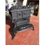 A Victorian cast iron stove by Smith & Wellstood, The Queen No 6, the top with twin hotplates