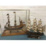 A painted cased model galleon with canons, rigging, parchment sails, etc; and three-masted Spanish