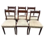 A set of six regency mahogany dining chairs, the tablet moulded backs above turned & twisted joining