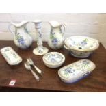 A Victorian cornflower decorated wash set with pair of ewers, candlestick, soap dish, etc., the