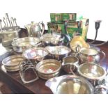 Miscellaneous silver plate including a pair of coasters, a teaset, toast racks, a rectangular