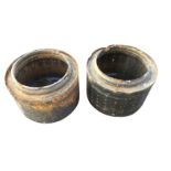 A pair of circular washing machine barrels forming garden planter tubs. (18in x l5in) (2)