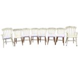 A set of eight painted slatback kitchen chairs, with squab loose cushions and solid seats, raised on