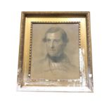 Nineteenth century pencil & pastel bust portrait of a young gentleman, unsigned, in gilt & gesso