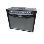 An American Peavey 75W modeling amplifier, the case with single speaker beneath control panel. (23.