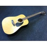 A Lorenzo steel string acoustic guitar with inlaid hardwood fingerboard, pine body, chromed