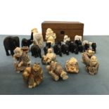 Miscellaneous carved African elephants, Japanese & Chinese coloured netsukes, a pair of monk style