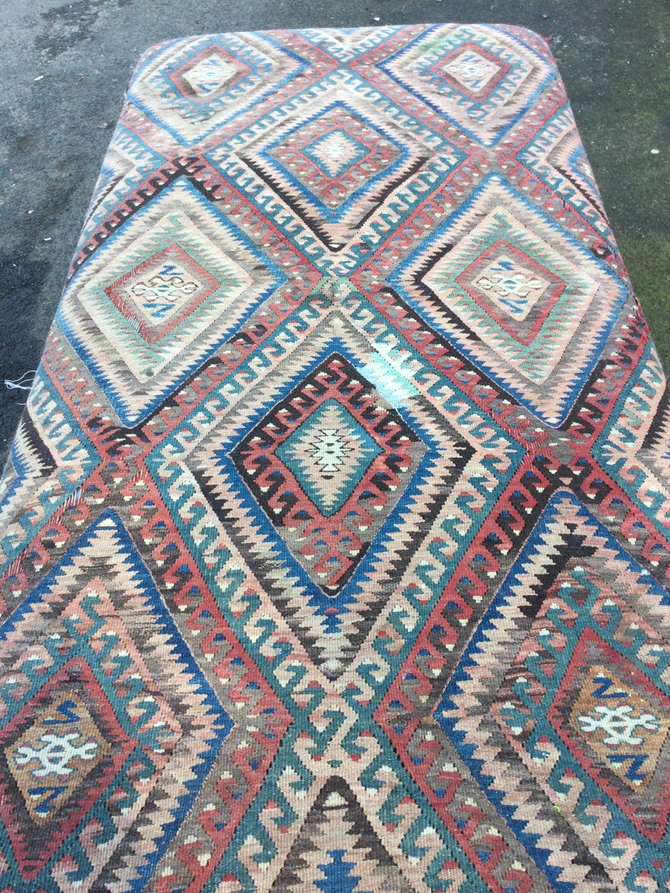 A large kilim covered ottoman stool, the antique weaving with hooked lozenge panels above a - Image 2 of 4