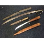 An iron dagger with spear type blade having riveted wood handle - 14in; a curved sword with wood &