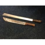 A large machete, the tapering blade stamped Llauger having riveted horn handle - 25.5in; and another