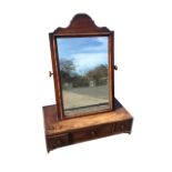 A nineteenth century mahogany dressing table mirror, the cushion moulded framed plate with arched