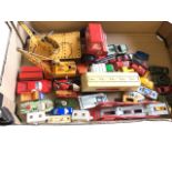 A small collection of "played with" toy cars - Matchbox, Dinky, a Meccano style crane wagon,