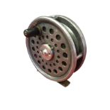 A Walker Bampton 3.25in trout fly reel with brass fitting.