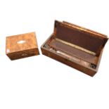 A Victorian mahogany writing slope with brass military style mounts, the interior with inkwell,