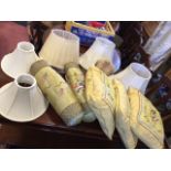 A set of five Chinese embroidered silk cushions with cranes & foliage on lemon yellow ground; five