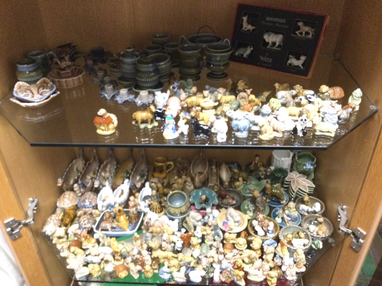 A large collection of Wade whimsies - animals, figures, Viking boats, tortoises, bowls, pots,