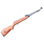 An unmarked .22 air rifle, with lever action and beech stock. (41in)
