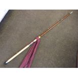 A Greys of Alnwick 9ft salmon two-piece spinning rod, with cloth sleeve.
