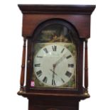 A nineteenth century oak loncase clock by Thos Graham of Bellingham, the arched hood above a painted