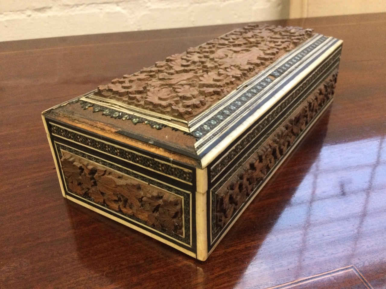 An oval nineteenth century brass box embossed with foliate scrolled decoration, with punched - Image 3 of 3