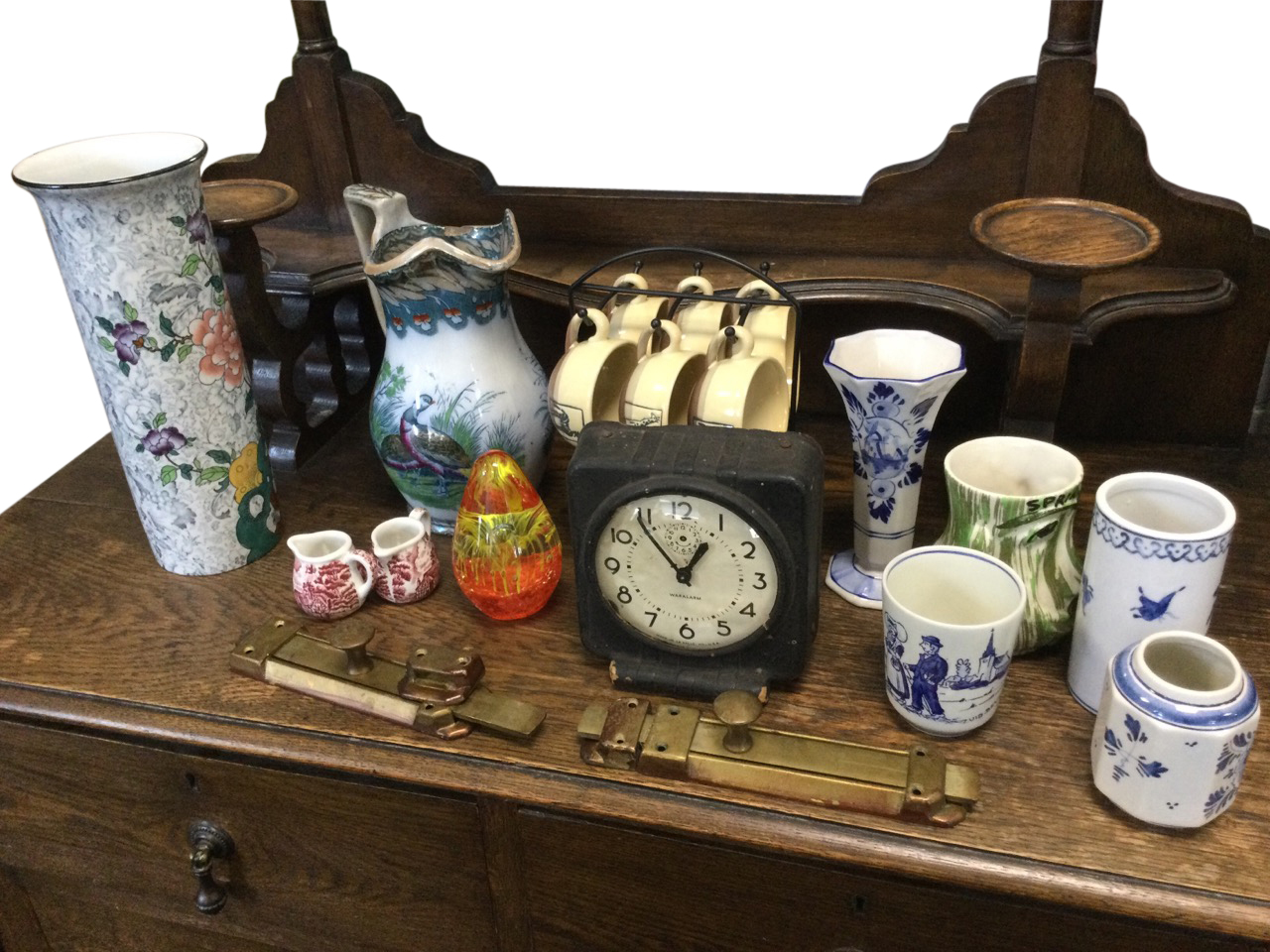 Miscellaneous ceramics including delft, a six-piece coffee set on stand, a glass paperweight, a Wood