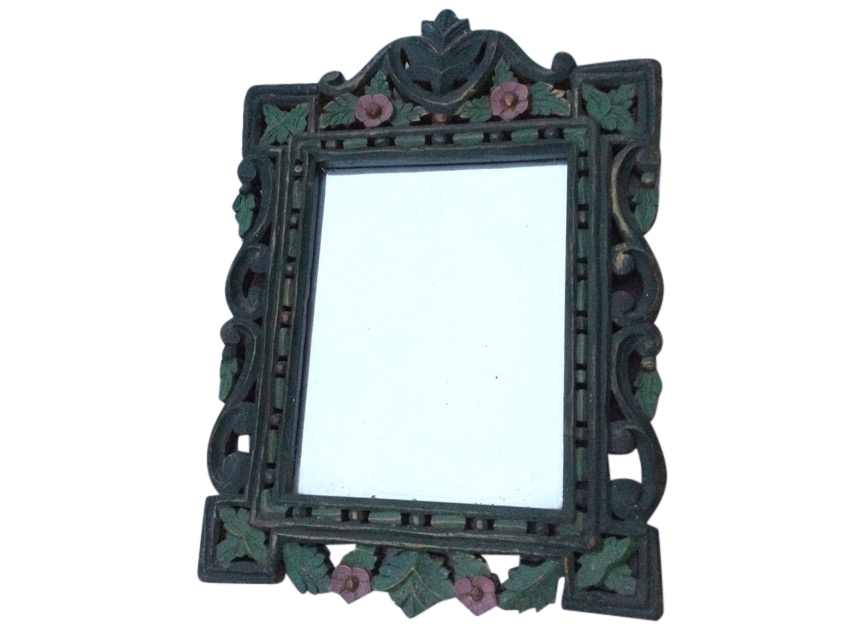 A carved and painted hardwood mirror, the rectangular plate in pierced leaf & floral carved scrolled