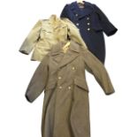 An army officers jacket; a naval double breasted serge coat with brass buttons and copper/gilt