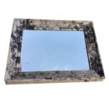 A leaf découpage decorated painted mirror with wide moulded frame and rectangular plate. (42in x