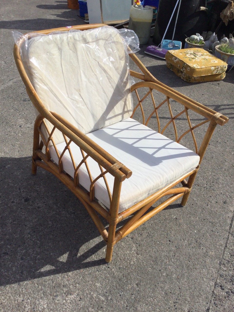 A pair of cane conservatory armchairs with loose linen upholstered cushions, the arms with stick - Image 3 of 3