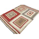 A contemporary Afghan rug woven with four rectangular panels in grey, ivory, madder and brown. (58in