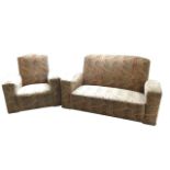 A 50s cut moquette sofa & armchair with padded backs and rounded platform arms above sprung seats,