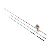 Three sea fishing rods - two with reels. (3)