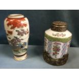 A Japanese stoneware satsuma vase decorated with exotic bird in landscape having gilded rims -