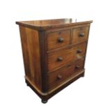 A Victorian mahogany chest of drawers, the rectangular rounded top above two short and two long