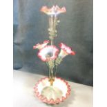 A fine glass eperne with four trumpet shaped vases with rippled rims having applied prunts to necks,