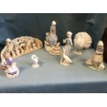 Five Lladro porcelain pieces - girls, birds, etc; a porcelain figurine of a seated old lady; and a