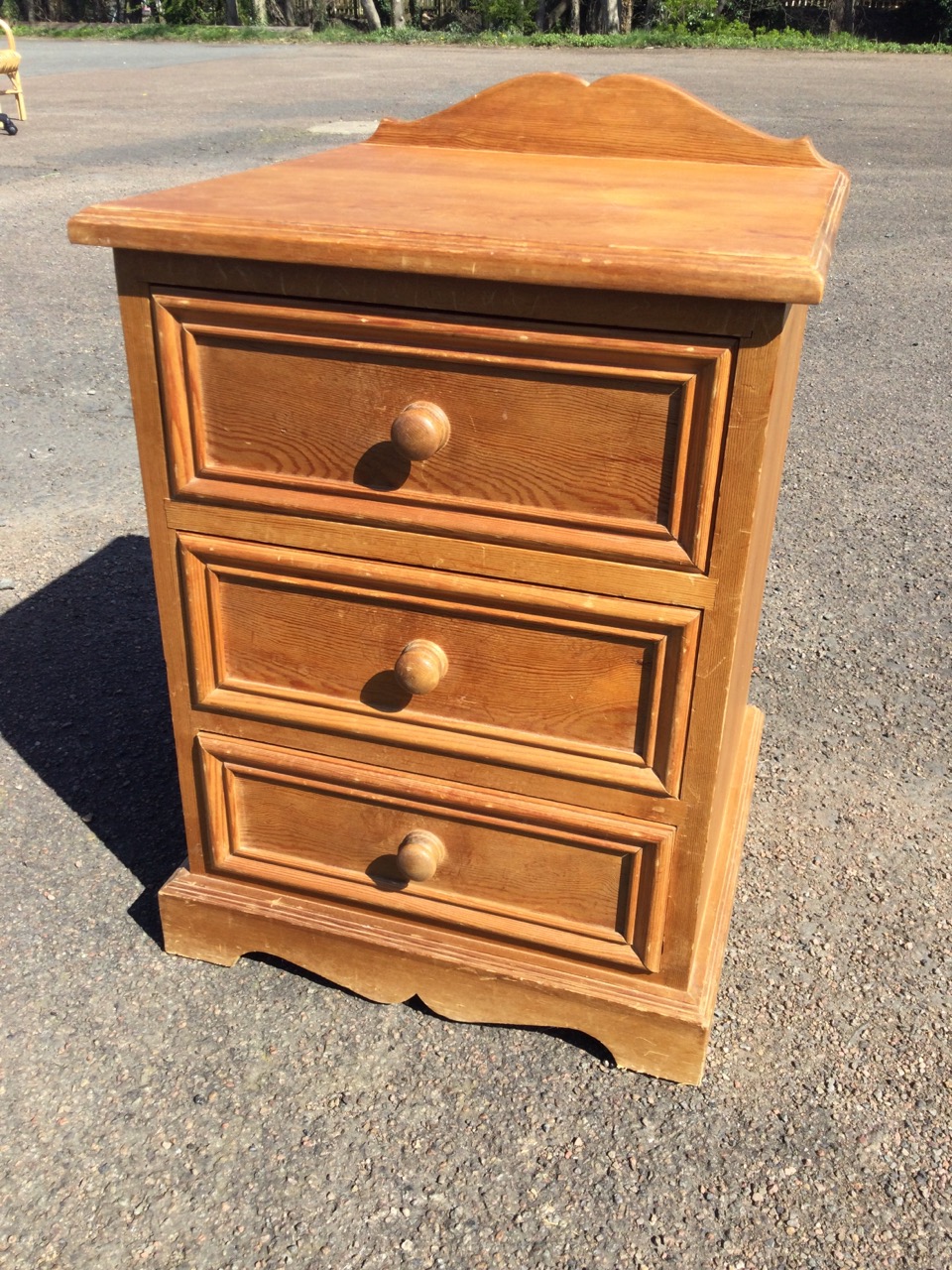 A pair of pine bedside cabinets with shaped upstands to moulded tops, each having three panelled - Image 2 of 3