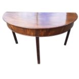 A late eighteenth century mahogany dining table end, now acting as a hall table, the single piece