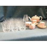 A married set of 12 cut glass tumblers; a Spode brick-red floral part teaset; and a pair of cut